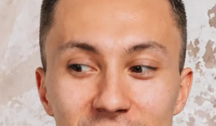 Eyes lowered down and to the left: irises in the lower left corners, upper eyelids slightly drawn down