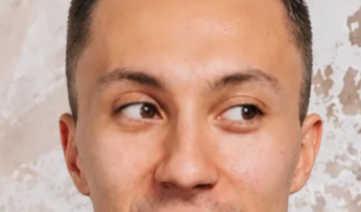 Gaze straight to the right: both irises near the right corners of the eyes, sclera exposed on the left